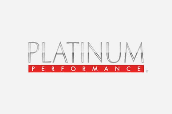 Logo with the word "PLATINUM" in large gray letters above a red bar containing "PERFORMANCE" in white capital letters, perfect for any vet or animal hospital, all set on a light gray background.